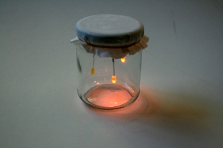 LED fireflies in a jar